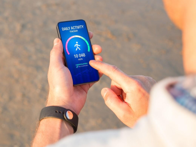 Man looking at health data on phone