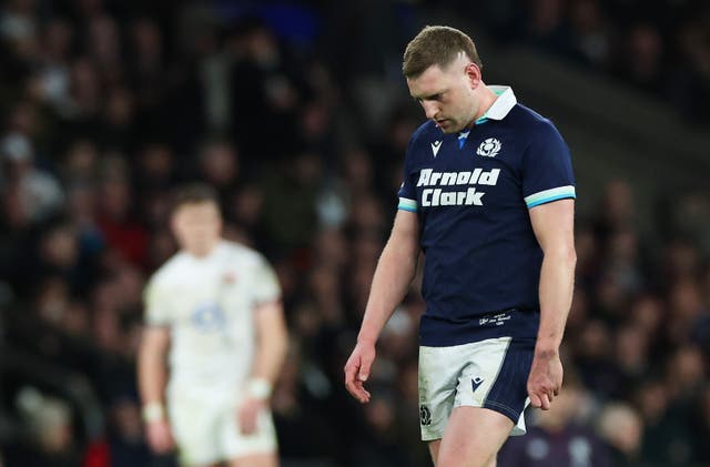 <p>Finn Russell missed three times from the tee in a narrow Scottish defeat</p>