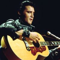 Elvis Presley performing on the television show "Elvis: The Comeback Special" (1968).