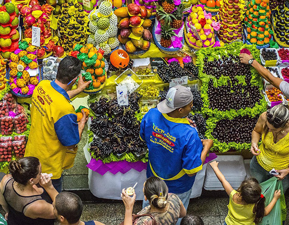 people in a green market