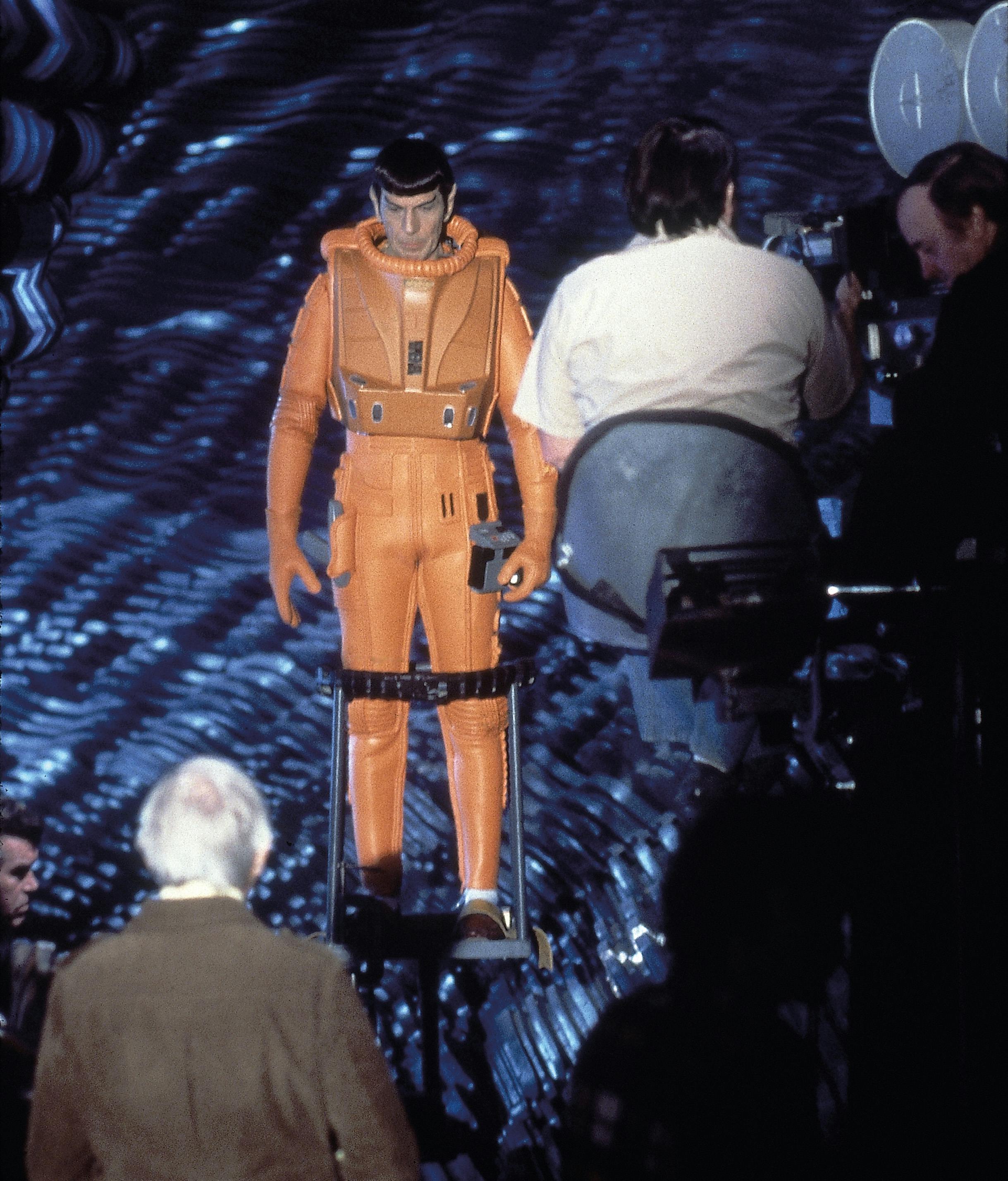 A behind-the-scenes shot of Leonard Nimoy as Spock wearing a space suit in Star Trek: The Motion Picture