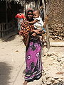 Image 4A woman in Kenya wearing kanga (from Culture of Africa)