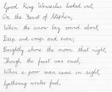 The first verse of "Good King Wenceslas" in cursive