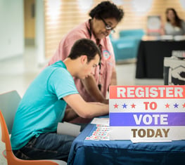 A young Pennsylvanian registering to vote at a LWV event