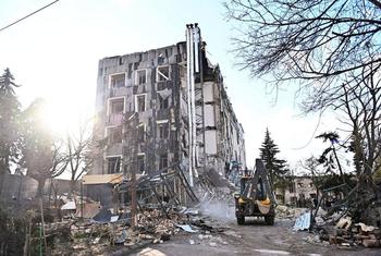 A building in Izyum, in the Kharkiv region of Ukraine lies in ruins after being struck by a missile. 