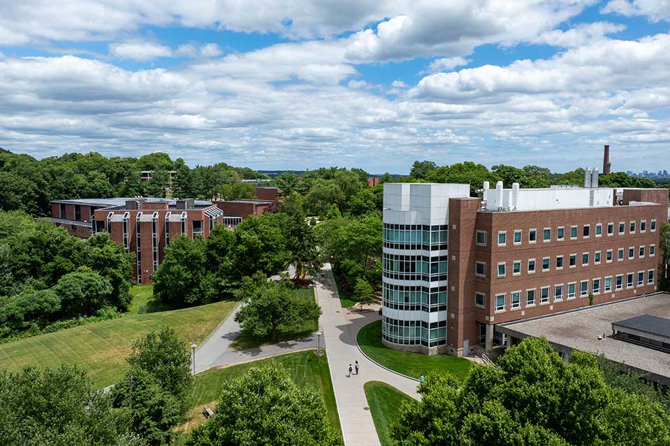 An aerial view of the Brandeis campus in summer.