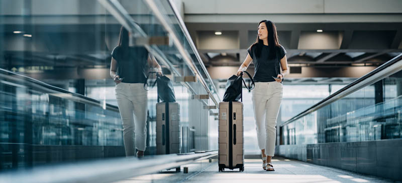 a girl in airport walking.