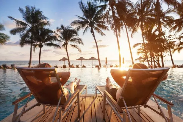 couple on sunloungers