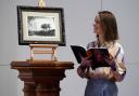 Hugo Burge Foundation chief executive officer Lucy Brown with the etching by Rembrandt (Stewart Attwood/PA)