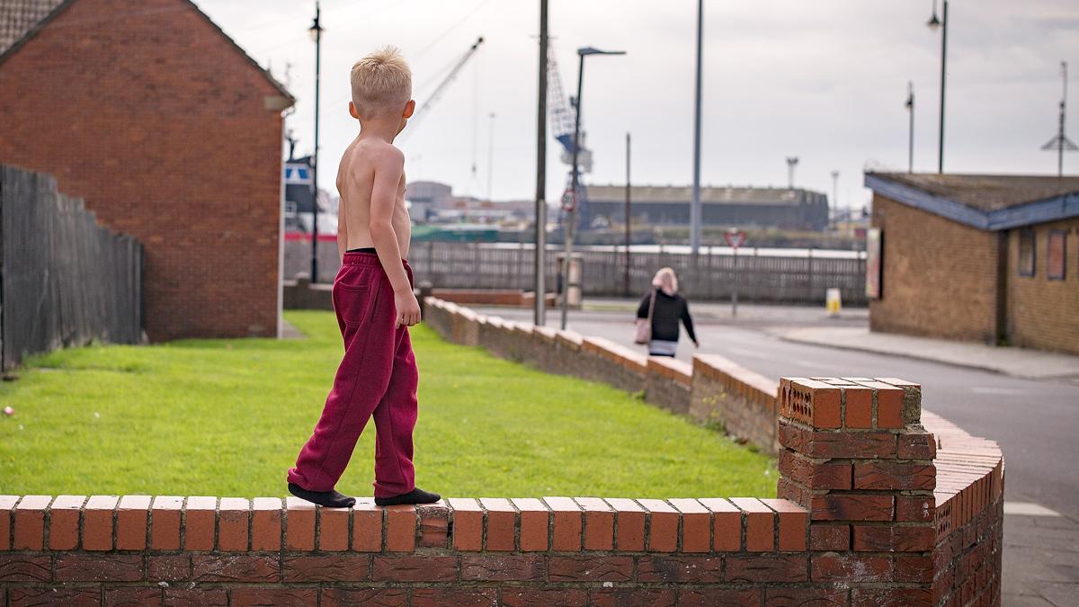 Child on a wall