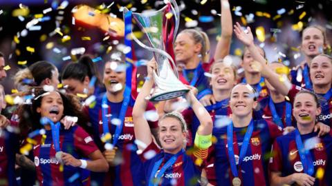 Barcelona lift the Women's Champions League trophy in 2024