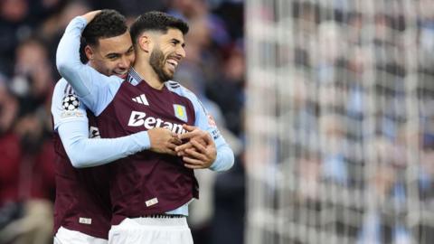 Aston Villa players celebrate