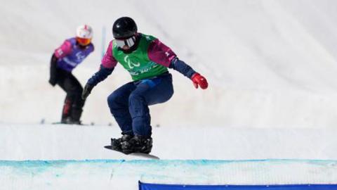 Para-snowboarder James Barnes-Miller competing at the Beijing 2022 Winter Paralympics