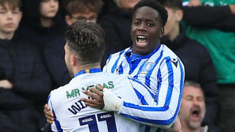 Sheffield Wednesday players celebrate scoring at Plymouth Argyle