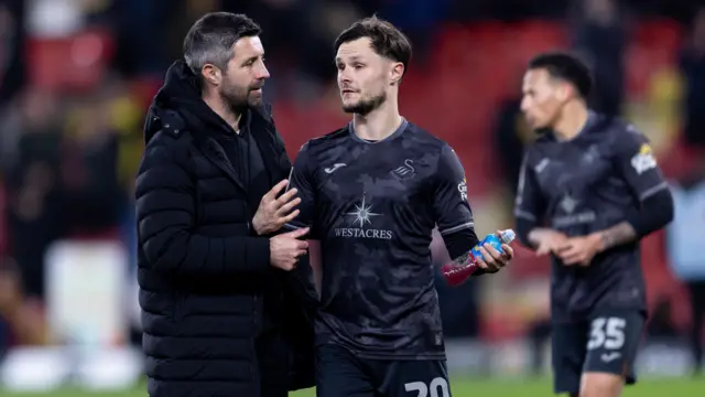 Alan Sheehan speaks to Liam Cullen after defeat at Watford