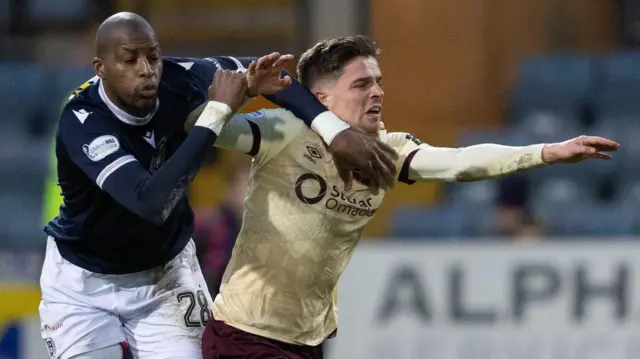 Dundee's Mo Sylla (L) and Hearts' Cammy Devlin