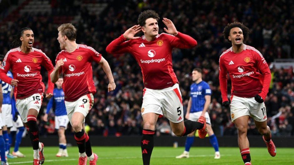 Manchester United defender Harry Maguire celebrates after scoring his second half winner against Ipswich at Old Trafford