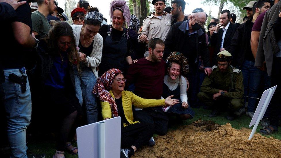 Mourners attend the funeral of Hillel Yaniv and Yigal Yaniv, Israeli brothers from the Har Bracha settlement, who were killed by a Palestinian gunman as they were driving in the occupied West Bank (27 February 2023)