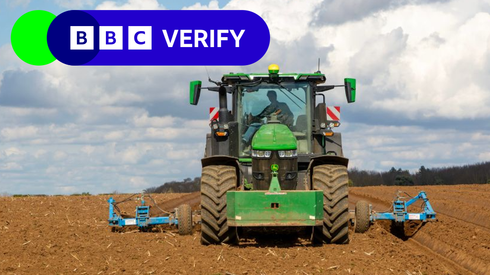 A green tractor ploughing a field in Suffolk. The BBC Verify logo is in the top corner.