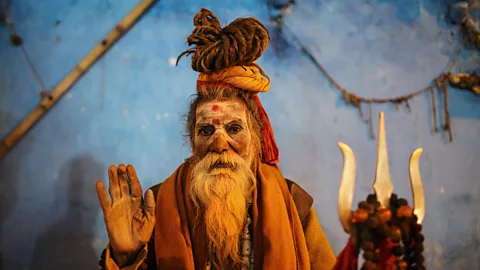 Maciej Dakowicz/Alamy Sadhus or holy men, wander the streets of Varanasi (Credit: Maciej Dakowicz/Alamy)