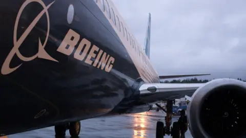 Reuters A Boeing 737 Max plane sits outside the hangar in Renton, Washington, USA