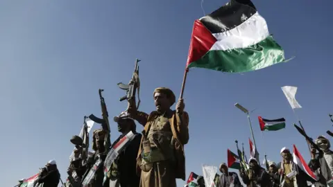 Getty Images Houthi fighters in a pro-Palestine demonstration in the Yemeni capital, Sanaa