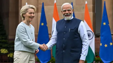 Getty Images European Commission President Ursula von der Leyen shaking hands with Indian Prime Minister Narendra Modi at Hyderabad House in Delhi, ahead of their extensive discussions
