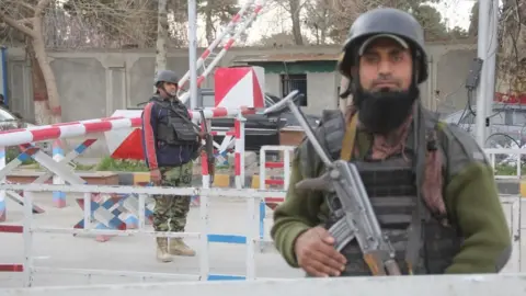 Pakistani security officials inspect vehicles at a checkpoint after security was intensified following a suspected militant attack on a passenger train in Sibi, Quetta, Balochistan province, Pakistan, 11 March 2025.