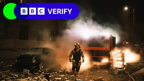 Firefighters continue to extinguish the fire on the fifth floor of a residential building following the Russian Shahed drone attack on Kharkiv, Ukraine on March 02, 2025