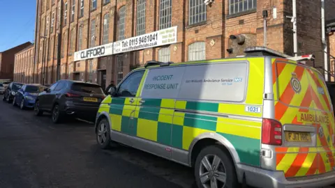 Incident Response Unit ambulance outside health club in an old-fashioned building