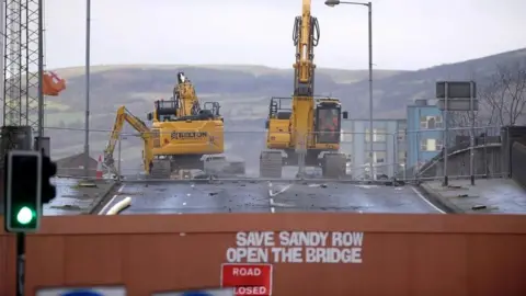 Pacemaker Diggers at work on the Boyne Bridge near Sandy Row in south Belfast