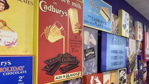 Several posters and images advertising Cadbury brands throughout the years.