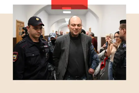 Getty Images Russian opposition activist Vladimir Kara-Murza is escorted for a hearing at the Basmanny court in Moscow 