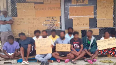 BBC Sri Lankan Tamil migrants hold a 'silent protest' on Diego Garcia