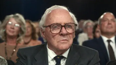 Warner Bros Sir Anthony Hopkins playing Sir Nicholas Winton - still from the film