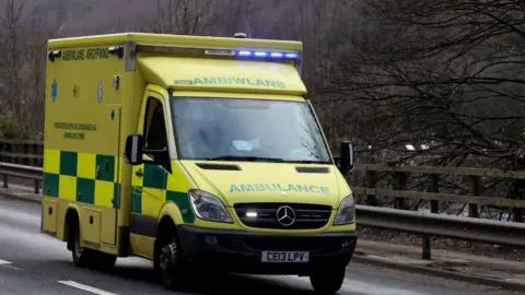 Getty Images A view of staff from the Welsh Ambulance Service Trust answering an emergency call on March 18, 2023 in Abercarn, Wales. 