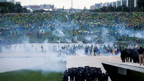 Crowds of Bolsonaro supporters participating in the violent protest and eventual siege of Brazil's government buildings in Brasilia on 8 January 2023