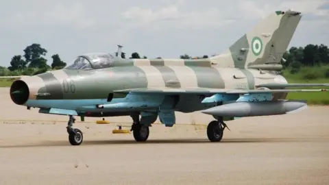 Nigeria Air Force HQ/Facebook A military aircraft at an airport