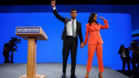 Reuters Last year, the then-prime minister Rishi Sunak and his wife Akshata Murty both gave speeches at the Conservative Party's annual conference