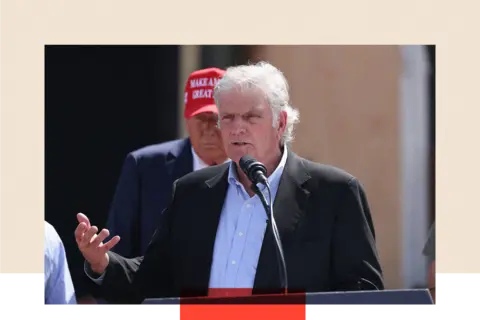 Getty Images Franklin Graham speaking alongside Donald Trump