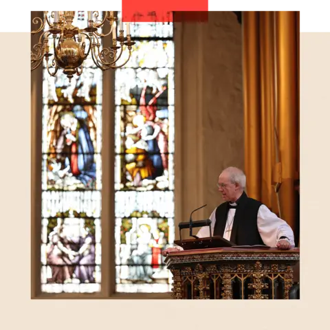 Getty Images The Archbishop of Canterbury speaks from a pulpit in front of a stained-glass window