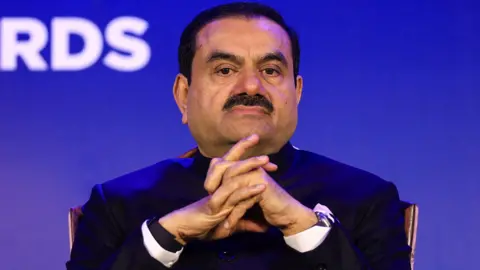 Reuters Indian billionaire Gautam Adani attends the 51st Gems and Jewellery Awards in Jaipur, India, November 30, 2024. REUTERS/Stringer