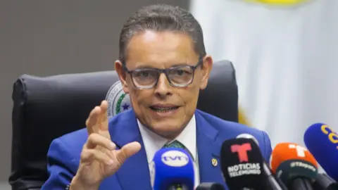 EPA Panama's Minister of Public Security Frank Ábrego said the migrants are in "temporary custody" for their protection