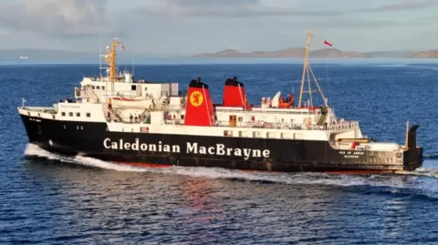 Tom Lennon A black and white ship with red funnels. The ships has a dated appearance. 