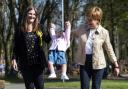 Nicola Sturgeon with Scottish National Party (SNP) Renfrewshire North and West MSP Natalie Don and her daughter Alisa Innes, in Renfrew in 2021 (Andy Buchanan/PA)